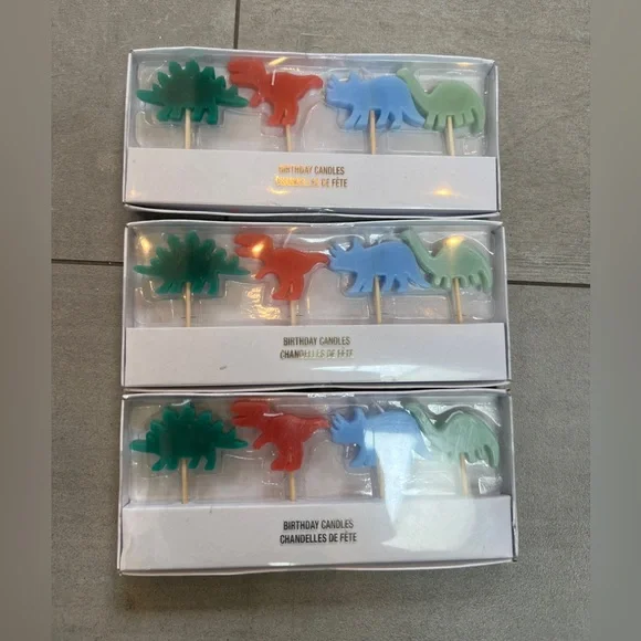 NWT Dinosaur Birthday Candles Set - each set has 4 candles approx 1”x2” each. 🦕