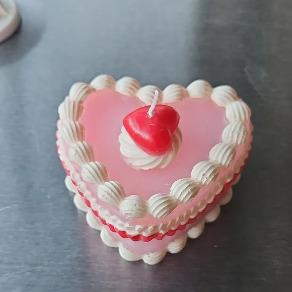 Heart-Shaped Pink Layered Candle with Red Cherry Accent