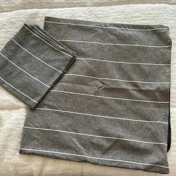 Two IKEA Mildrun pillow covers
