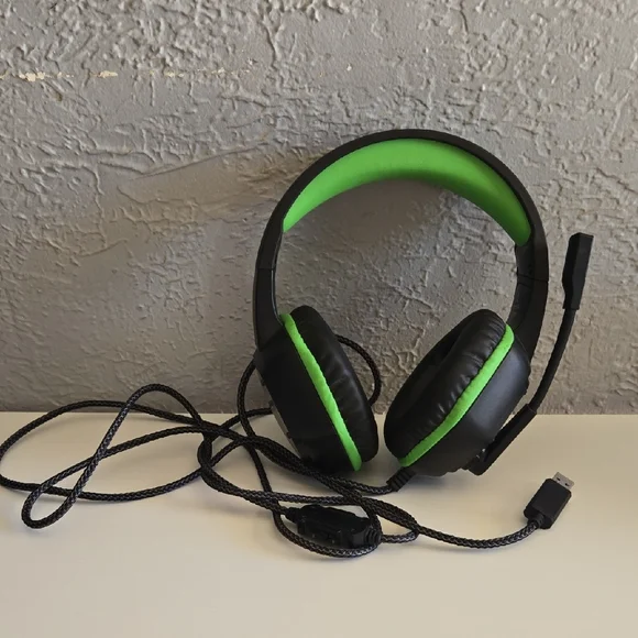 Sleek Black and Green Gaming Headset