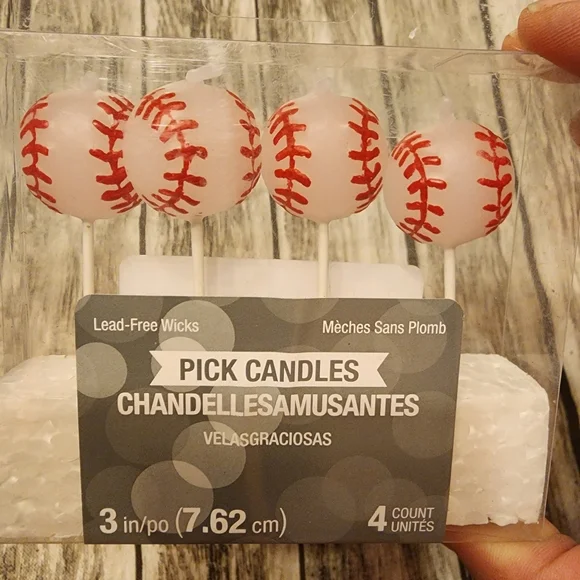 Baseball birthday party candles. Set of 4. Measures 3 inches tall per candle.