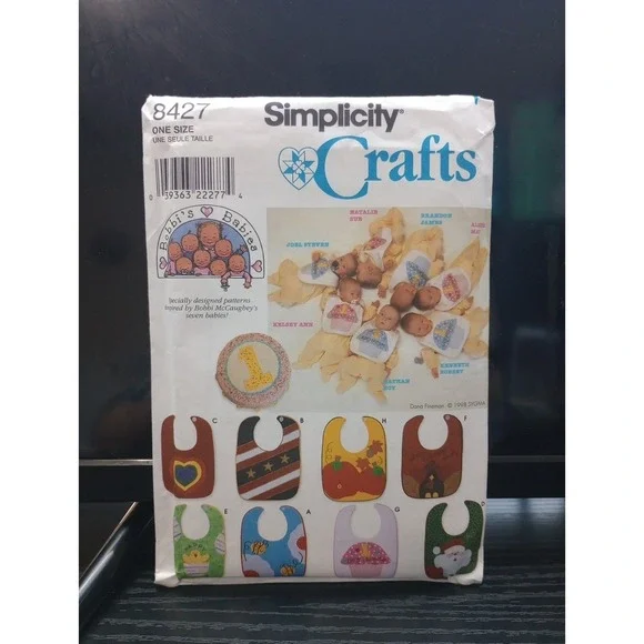 8427 Simplicity Crafts Sewing Pattern - Themed & Applique Baby Bibs Cut