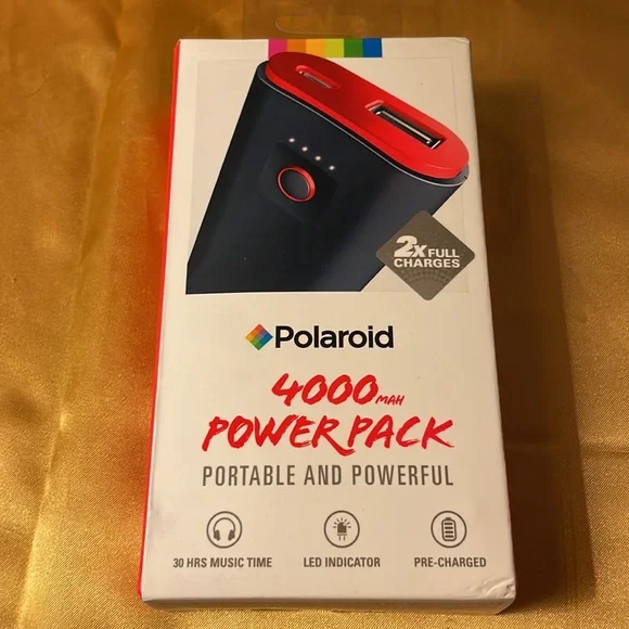New with tags- Polaroid micro-USB (in) & USB (out), LED indicator, red & black