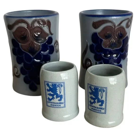 Lot of 4 Mini German Beer Stein Shot Glasses Löwenbräu & Grape Relief Design