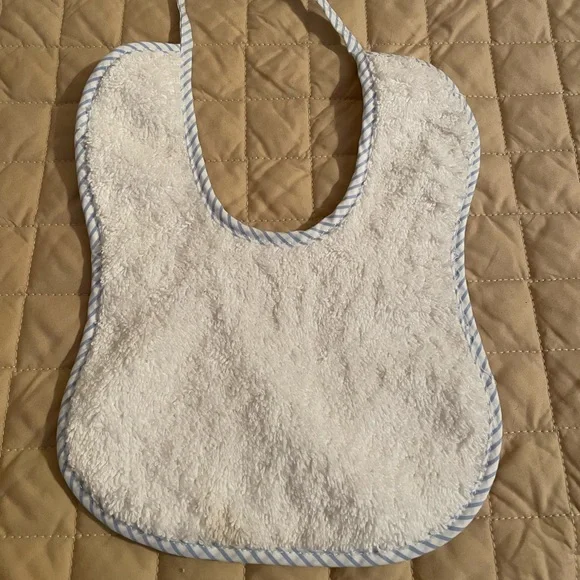 Handmade Bib white with blue trim, tie closure, brand new.