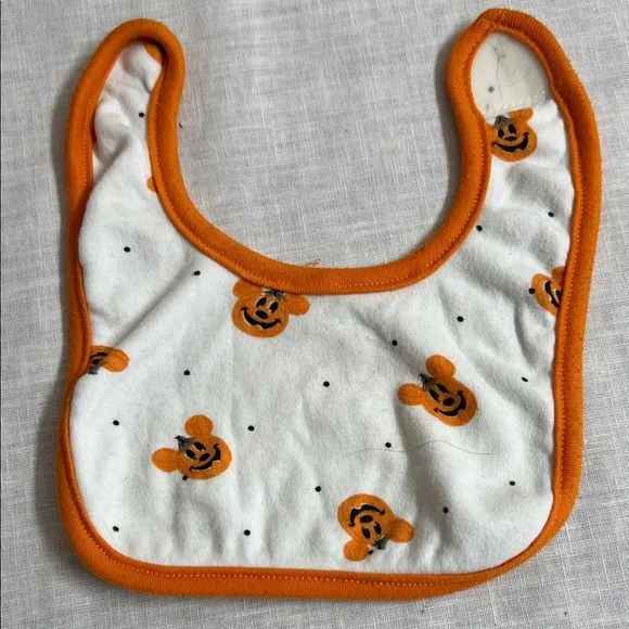 🌞 Carter’s Orange & White Baby’s First Halloween Mick Mouse teething Baby Bib