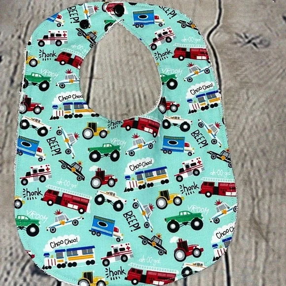 Designer handcrafted transportation bib