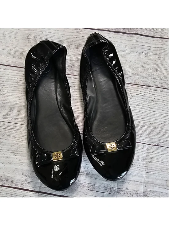 Tory Burch 10M shiny black ballerina flats with black and gold bow accent