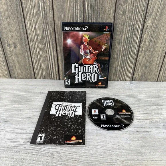 Guitar Hero (Sony PlayStation 2, 2006) Complete With Manual