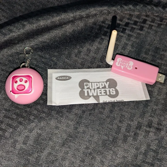 Pink Puppy Tweets Dog Tag and USB Adapter.