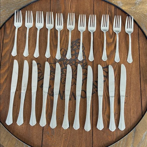 Oneida Stainless Flatware Dinner Knives and Forks set.