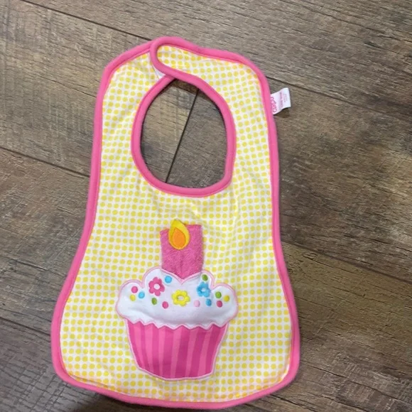Worn only once, “First Birthday” bib from Circo.