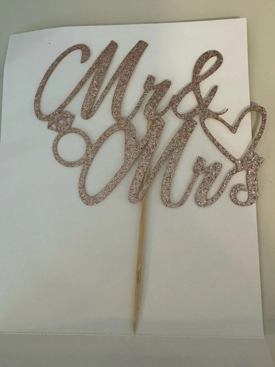 FREE when you bundle! Gold Mr. And Mrs. Wedding Cake Topper, never used