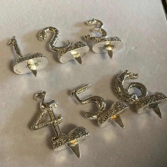 Silver tone animal birthday markers holds candle in each one . 1-6 . Pre owned