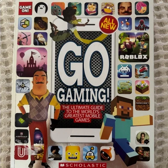 Scholastic White and Blue Gaming Guide for Video Game Enthusiasts
