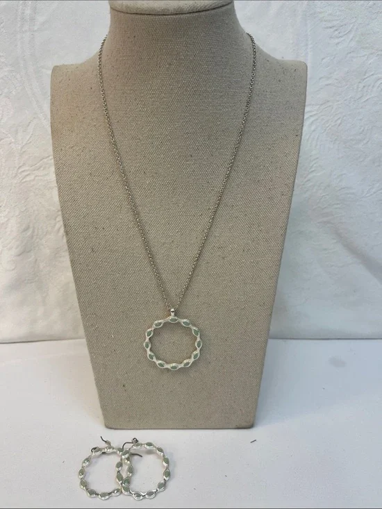Three piece set necklace, matching earrings, light green, circular design