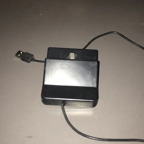Cell phone charging base adapter