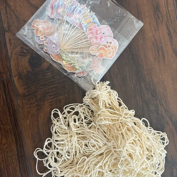 Under the sea toppers, fish net, and goodie bags