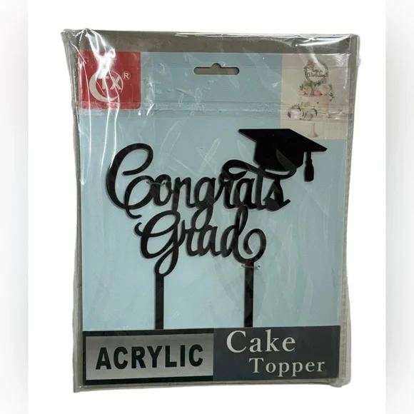 Congrats Grad acrylic cake topper brand new in packaging. Never opened or used!