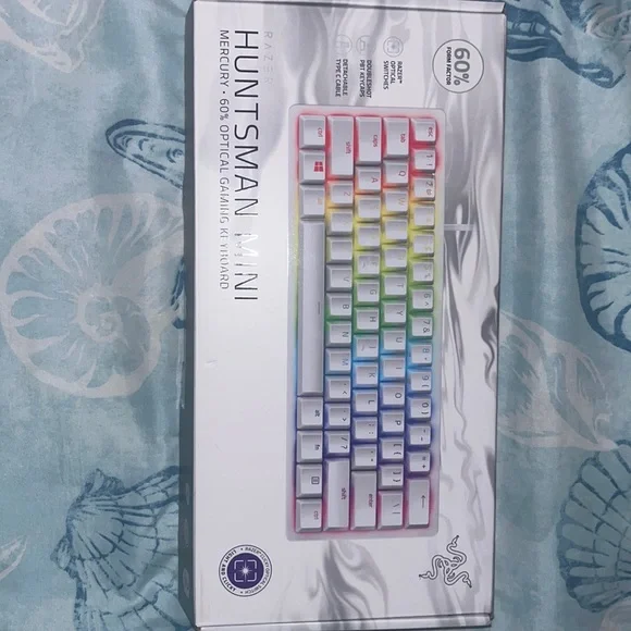 Brand new huntsman mini gaming keyboard never used.