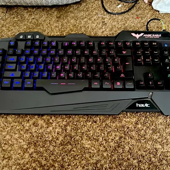 Blue and pink led lights under the keyboard.