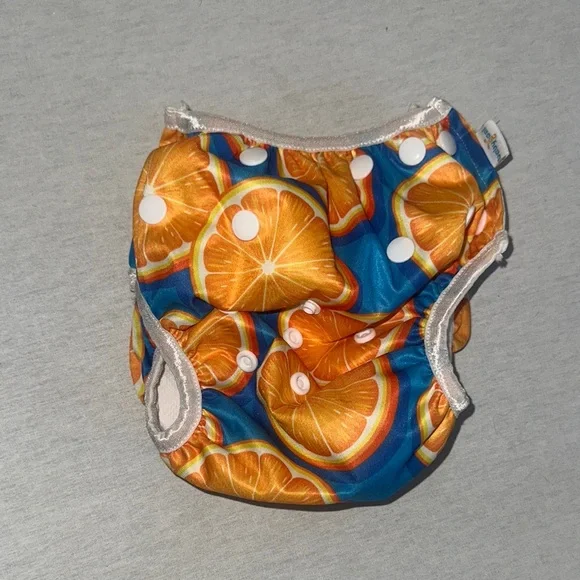 Kids OS Vibrant Orange and Blue Kids Diaper Cover.