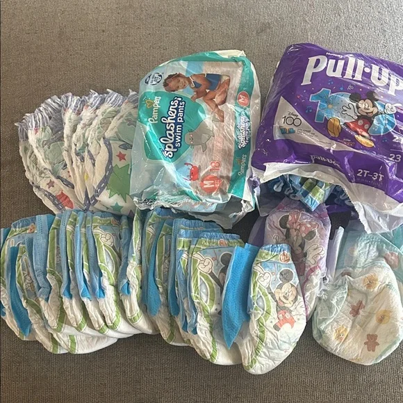 NEW Lot of pull ups, easy ups, pampers splashers 2T to 3T