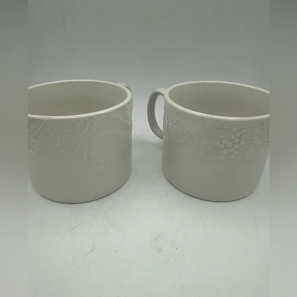 Pair Of Pier 1 Coffee Mugs White raised Fruit grape pears strawberries design