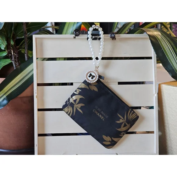 CHANEL Black/Gold Mini Pouch W/Detachable Strap Handle & Charm Added