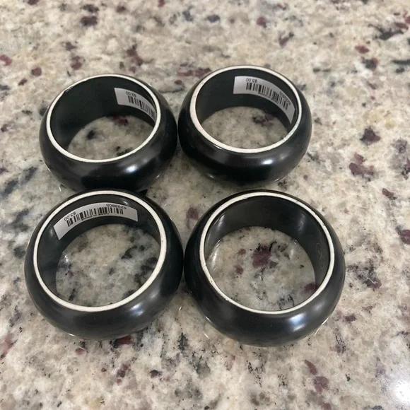 NWT Pier 1 Imports set of 4 black with white on one side ceramic napkin rings