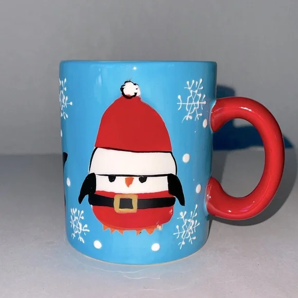 Pier 1 Penguin in Santa Outfit Blue Coffee Mug.