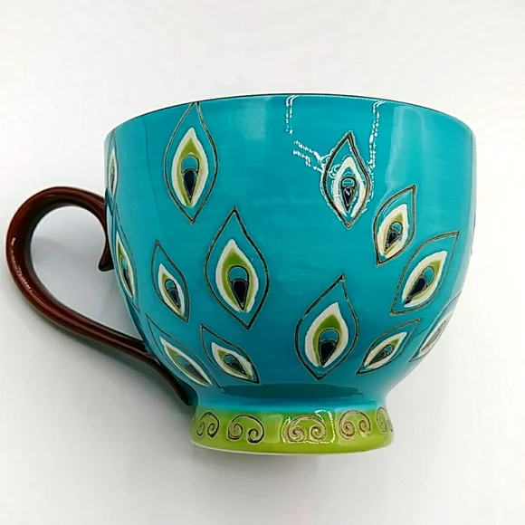 Pier 1 Beautiful Peacock Feather Decorated Mug.