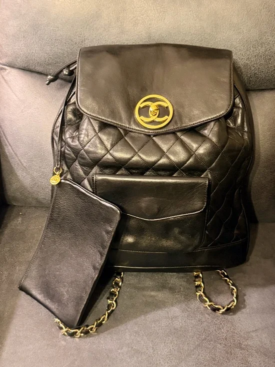 Vintage 24K CHANEL Black Quilted Leather Backpack with Gold CC Medallion