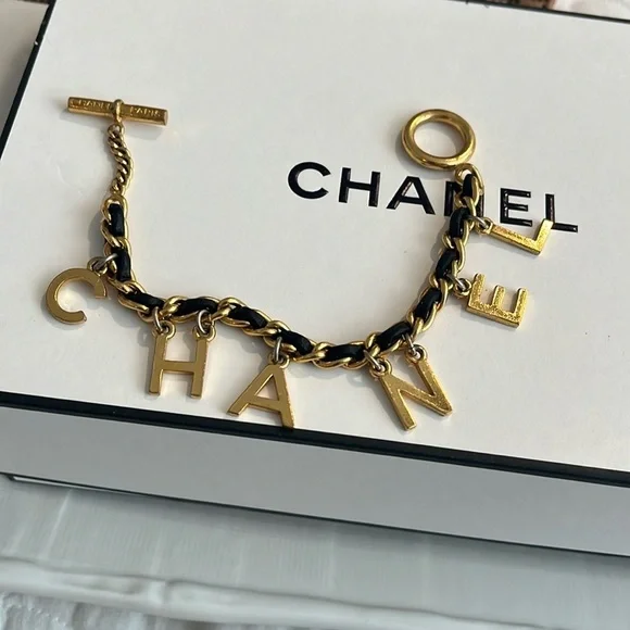 CHANEL RARE VINTAGE TOGGLE LEATHER CHARM BRACELET