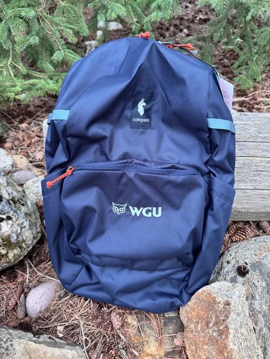 cotopaxi WGU Navy Backpack with Light Blue Accents and Orange Zippers
