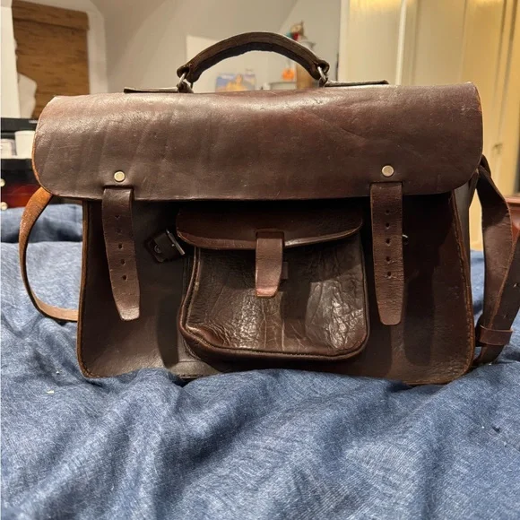 Brown Vintage Leather Briefcase with Adjustable Strap and Buckle Closure