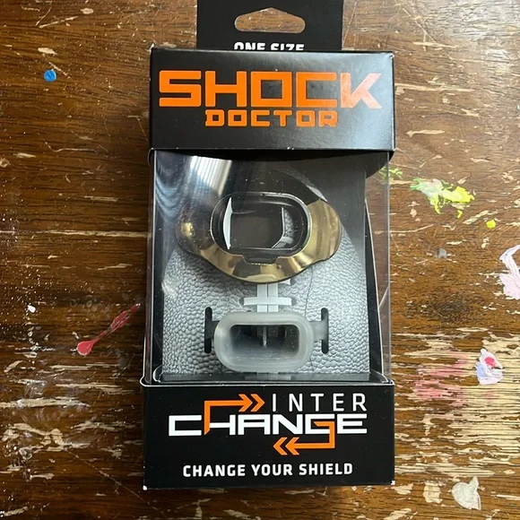 Shock dock lip guard protection for sports