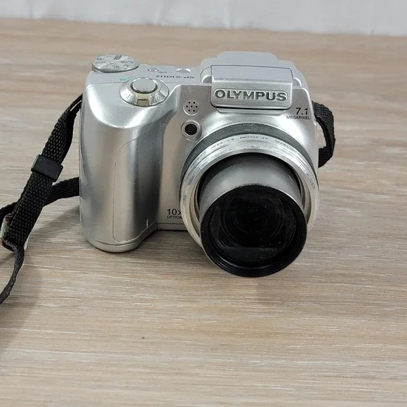 Olympus SP-510UZ 7.1 Megapixel Digital Camera 10x Optical Zoom Silver No Cap
