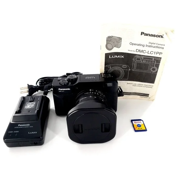 Panasonic Lumix DMC-LC1 5.0MP Digital Camera w/ SD Card, Battery, Charger Tested