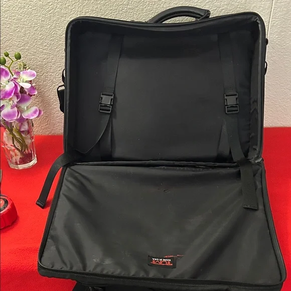 Tumi Black brief case/messenger bag