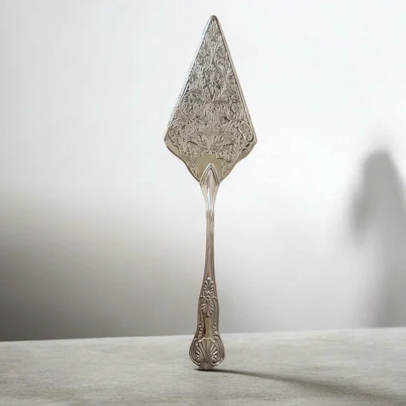 vintage silver-plated pie or cake server, frequently produced in Italy