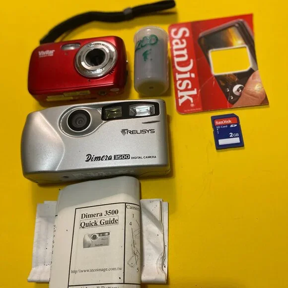 CAMERAS, VIVITAR AND DIMERA DIGITAL 3500 GENTLY USED