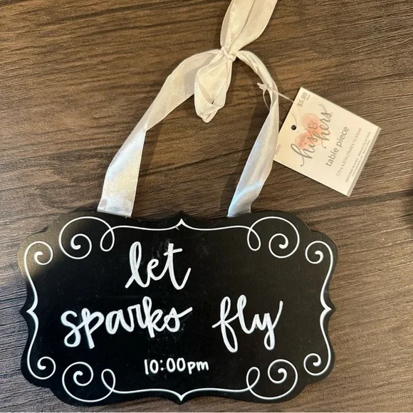 Black Hanging Sign with White Ribbon