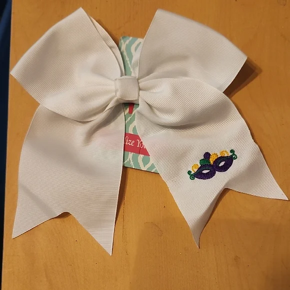 White Embroidered Mardi Gras Design