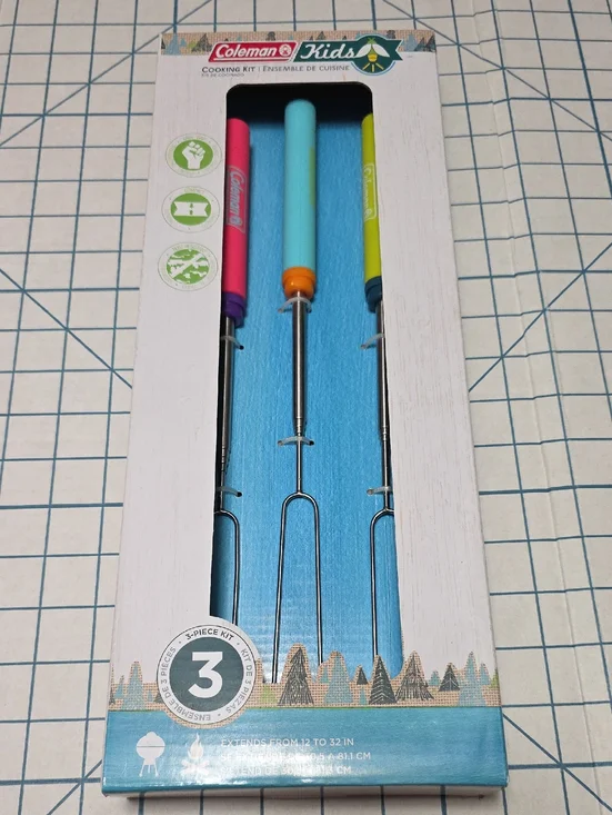 Coleman Kids roasting forks with pink, teal, yellow handles