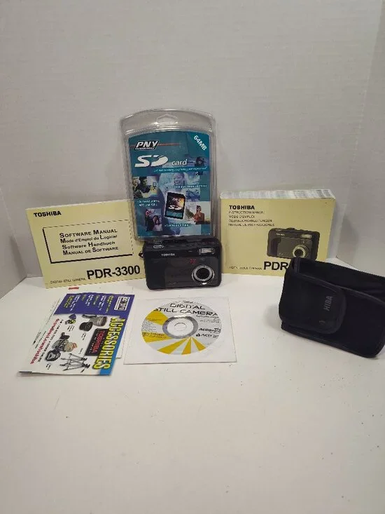 Toshiba PDR-3300 Digital Camera Tested Working Box Manuals CD 64MB SD Card