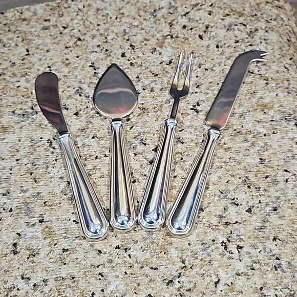 Pottery Barn Vintage 4-piece Stainless Steel Cheese Serving Utensils Set.