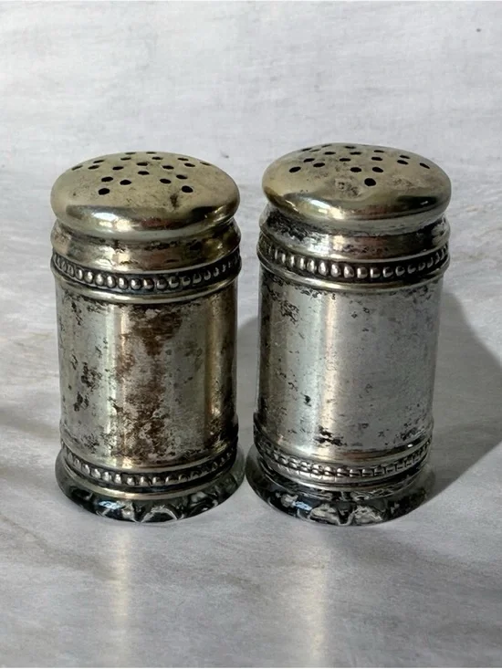 pair of antique EPNS silver salt and pepper shakers