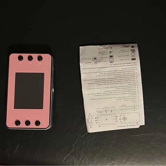 Pink Digital Camera with Instructions