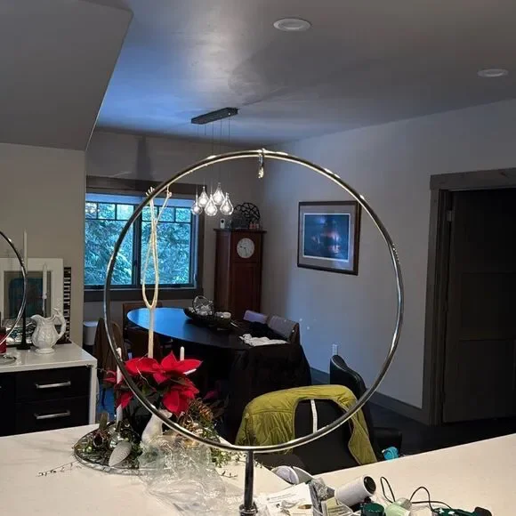 Restoration Hardware wreath hanger, silver can expand height see picture. Nice.